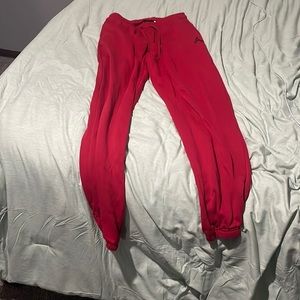 Red Nike sweatpants, loose fit, XS